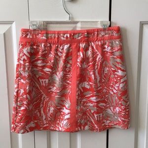 Izod women’s size M Golf Skirt Melon/tan/white